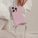 Pink phone case with heart patterns and a ribbon held by a person against a neutral background
