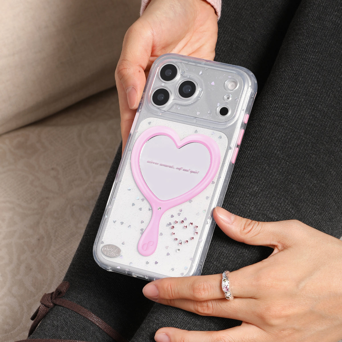 Phone case with heart mirror design