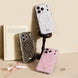 Three phone cases with polka dot designs on a beige surface with a book and ribbon.