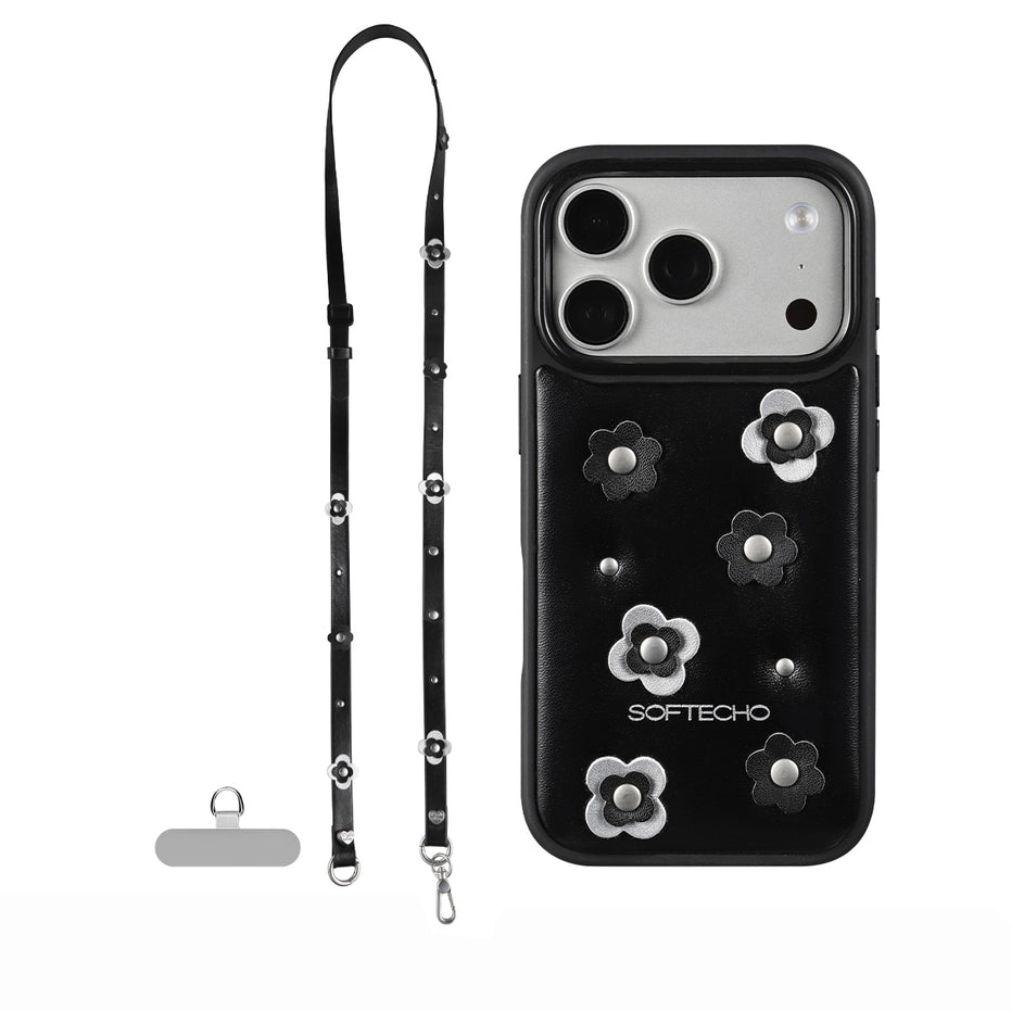 Black phone case with floral designs and a lanyard on a white background