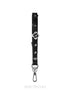 Black leather strap with silver flower charm and hardware on a white background, branded 'SOFTECHO'.