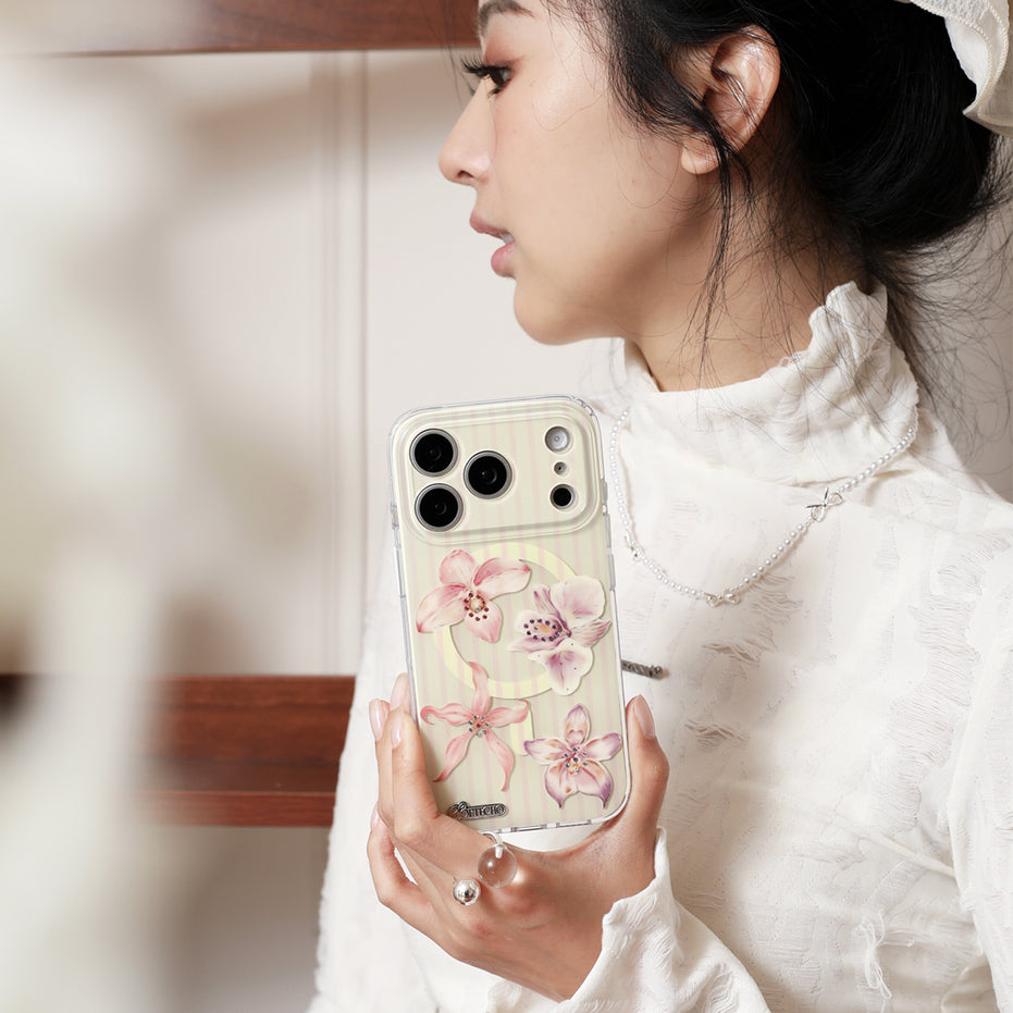 Blush orchid crystal MagSafe iPhone case with floral collage design