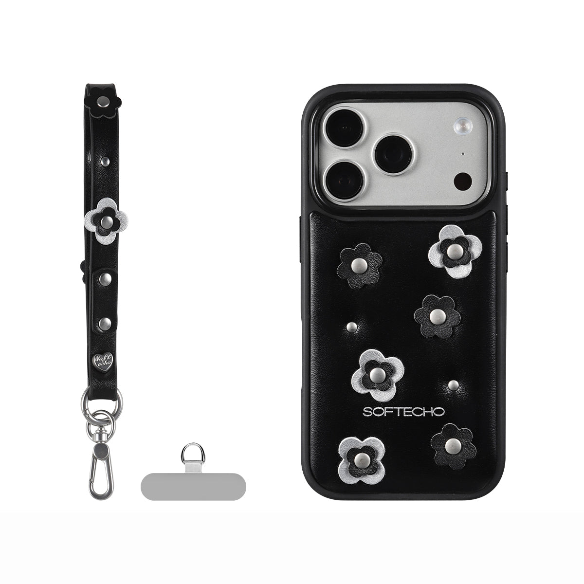 Black phone case with floral designs and accessories on a white background